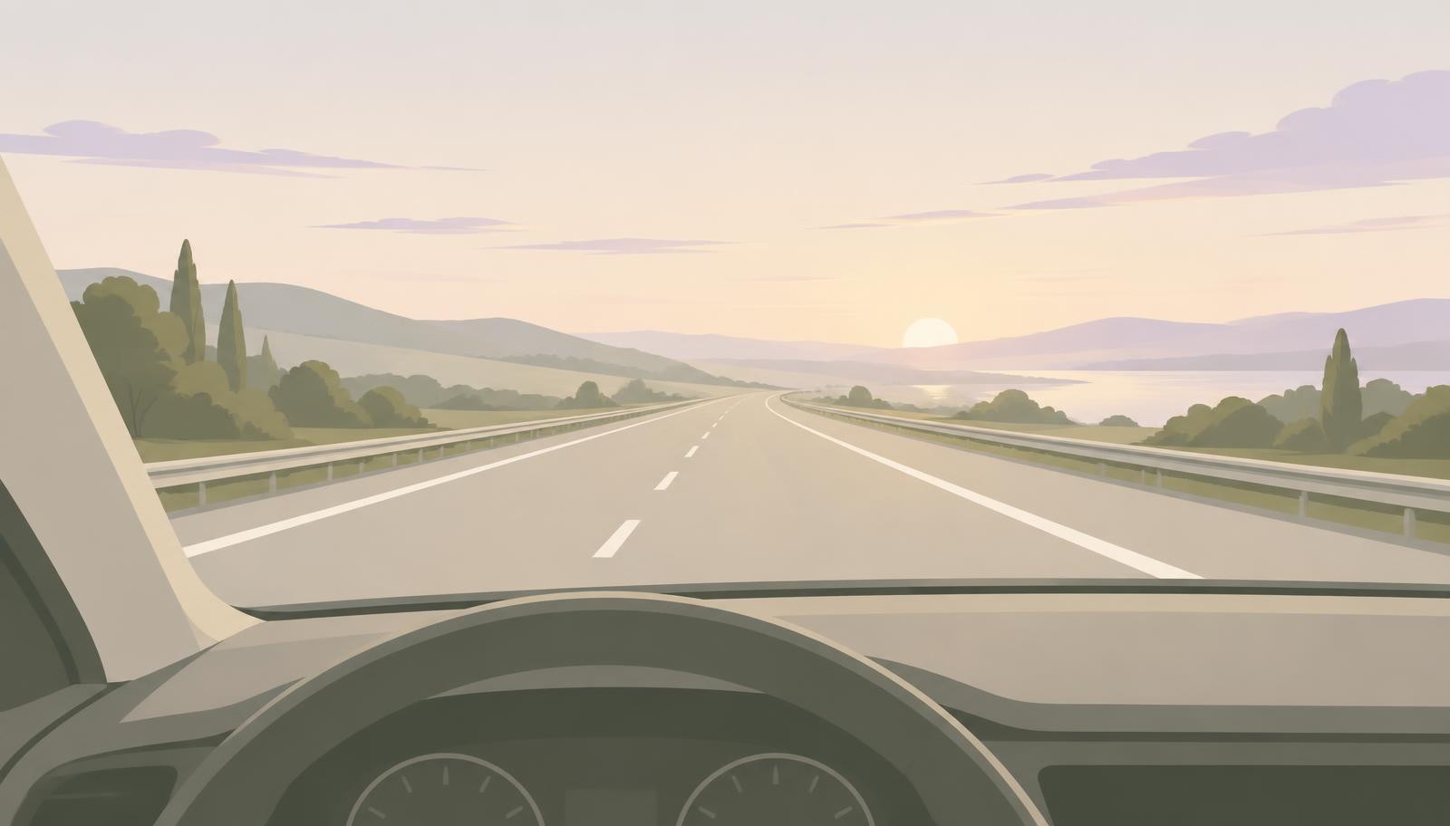Vue depuis le volant d'une voiture sur une autoroute calme au lever du soleil